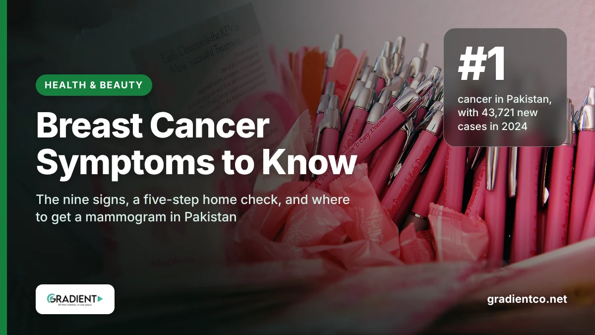 Breast cancer symptoms awareness: pink ribbon pins, pink pens and an early detection leaflet handed out during Breast Cancer Awareness Month